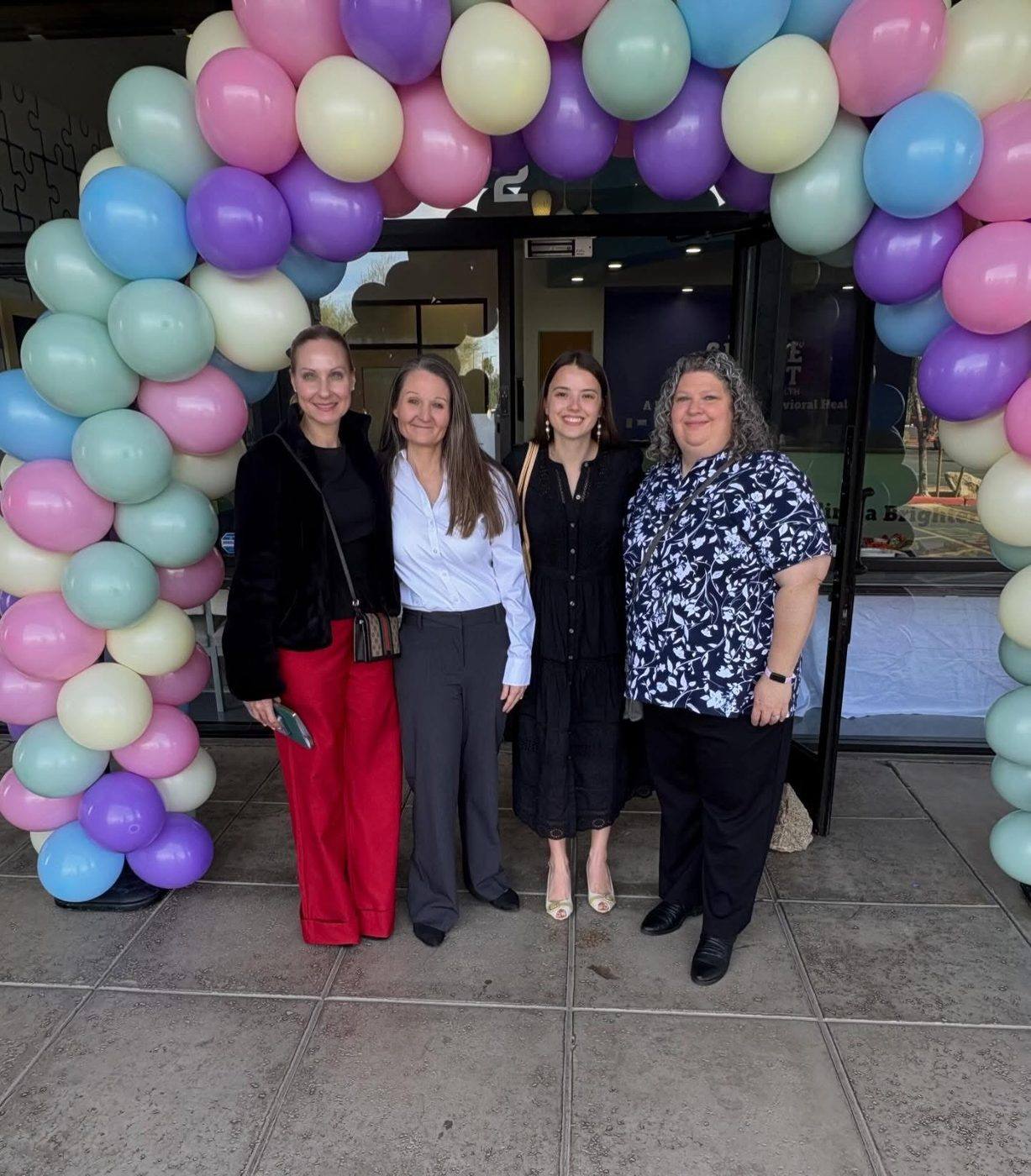 Axis for Autism team members and clinic moments with families and staff