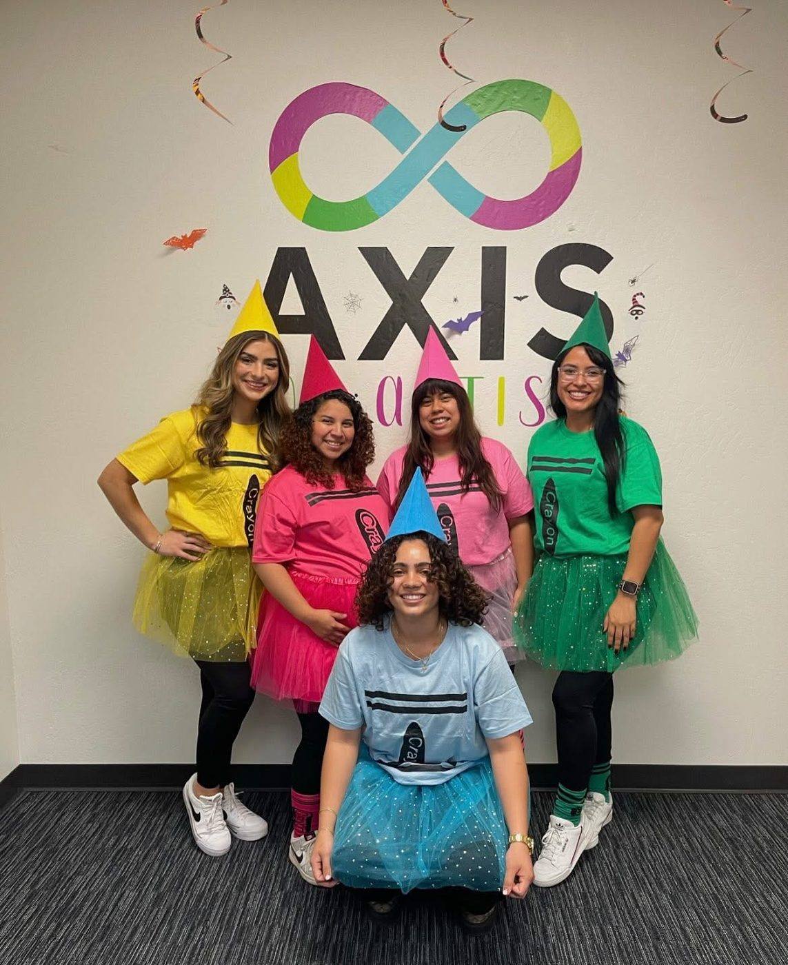 Axis for Autism team members and clinic moments with families and staff