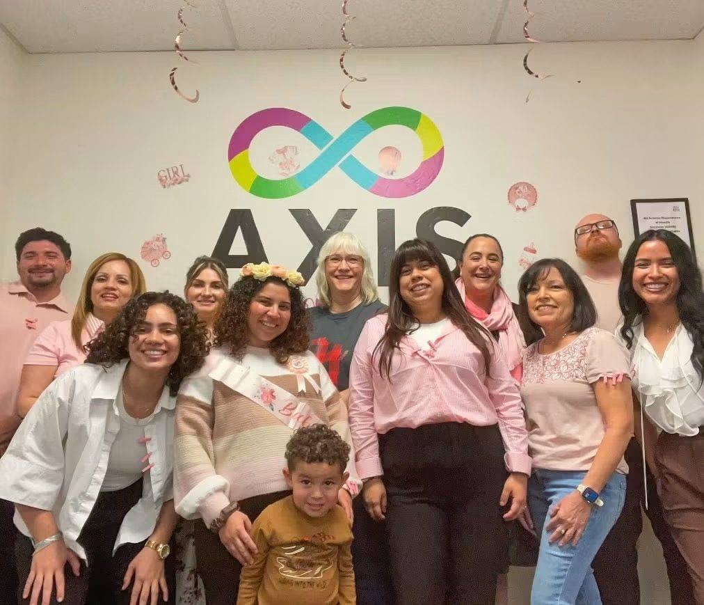 Axis for Autism team members and clinic moments with families and staff