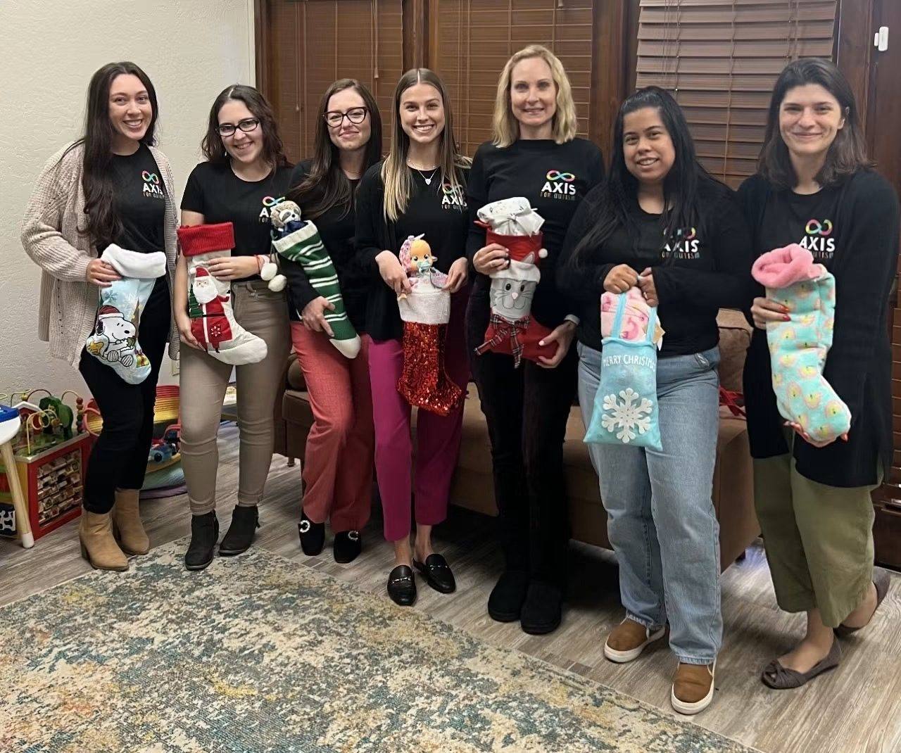 Axis for Autism team members and clinic moments with families and staff