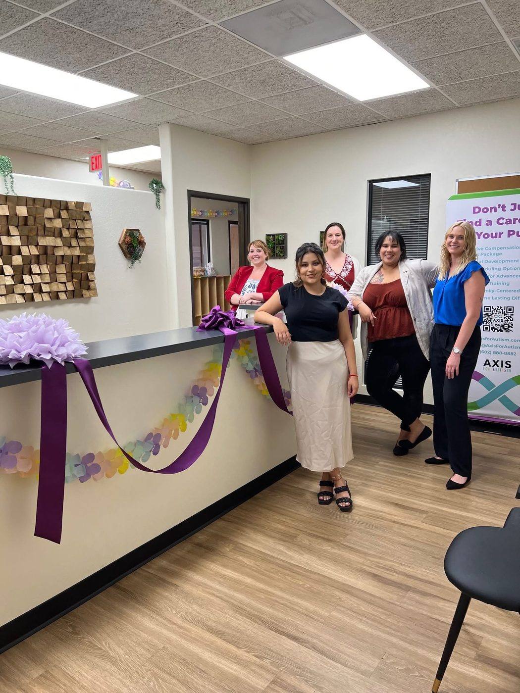 Axis for Autism team members and clinic moments with families and staff